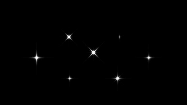 Twinkling stars shining animation, magical glowing starry sky animation with twinkling stars, sparkling white lights and seamless loop celestial background on black screen in ultra HD 4K