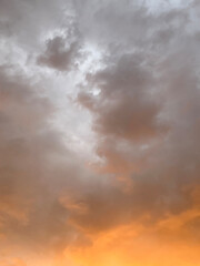 Obraz premium Orange sunset clouds and sky in the forest