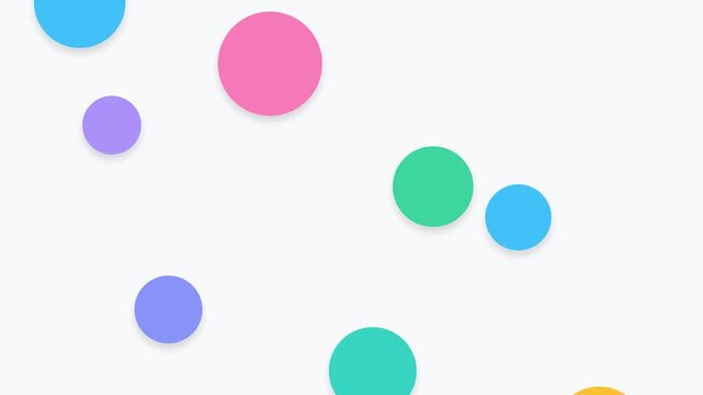 Colorful flat circles bouncing and floating on a white background