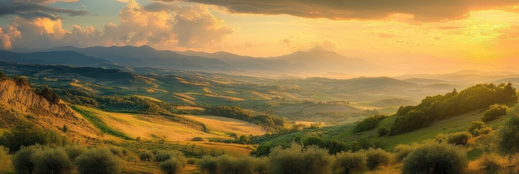 Golden sunset over rolling farmland and olive groves with patchwork fields, distant mountains and dramatic cloud-filled sky, peaceful warm evening panorama