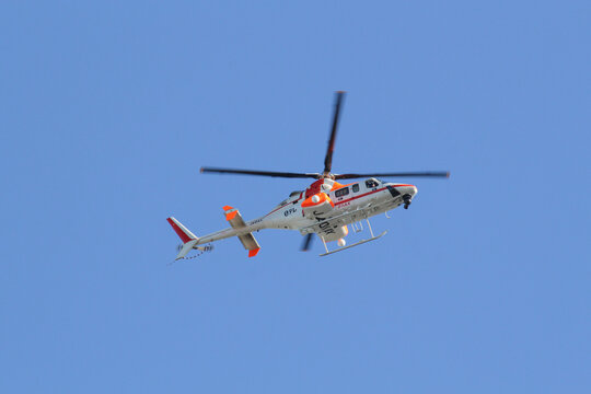 TOKYO, JAPAN - January 3, 2019: A Nippon Television news helicopter flying over Tokyo.