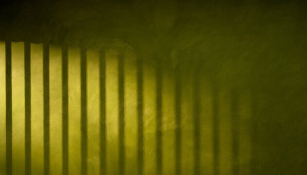 Light creating dark shadows on olive green wall