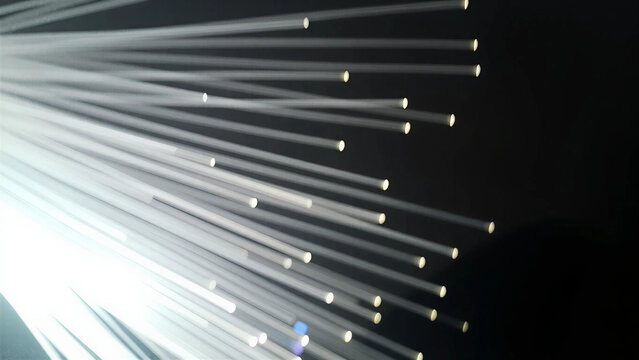 Macro view of glowing fiber optic communication cables