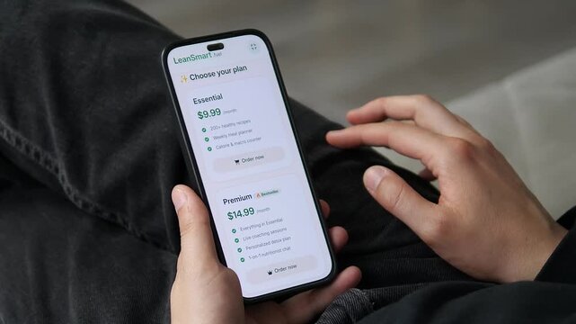 Smartphone displaying the Premium plans exclusive perks: live coaching sessions and a personalized detox plan. These features emphasize human support. Great for health tech, premium services, and