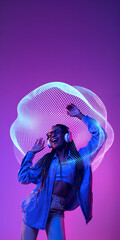 Woman enjoying headphones inside neon digital music bubble. Concept of personalized music listening, silent disco entertainment, digital nightlife promotion.