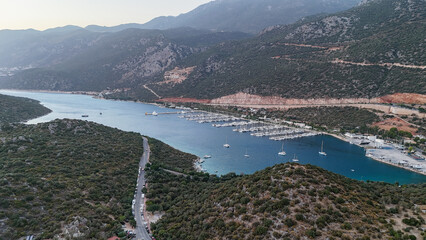 Fototapeta premium Aerial View of Kas Harbor at Twilight: A Scenic Mediterranean Escape in Turkey. 