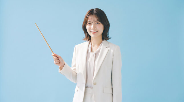 Professional Asian woman in white suit holding pointing stick