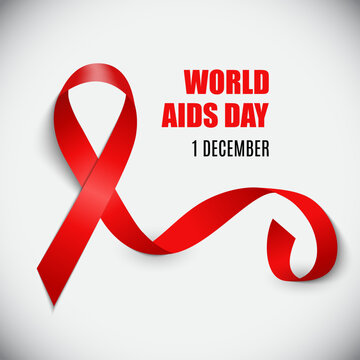 Red ribbon for world aids day with text on a white background