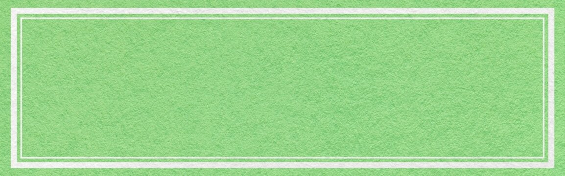 Light mint green textured paper background with white double frame border and copy space for website header banner template