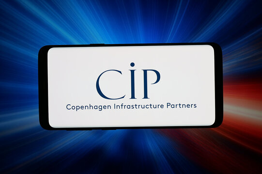 Stuttgart, Germany - 07-16-2026: In this photo illustration, the logo of Copenhagen Infrastructure Partners (CIP) is displayed on a smartphone in front of abstract background on computer screen.