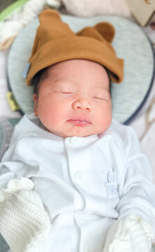 Adorable Sleeping Newborn Baby Wearing Cute Bear Ears Hat