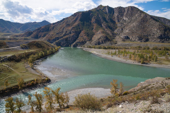 Place of the confluence of the Katun and Chuya rivers on a sunny September day. Altai Mountains, Russia