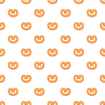 Salted pretzels forming a repeating pattern on a white background