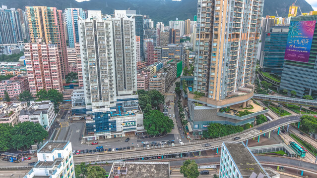 Hong Kong. July 5 2026 San Po Kong Skyline Beneath Dramatic Mountain