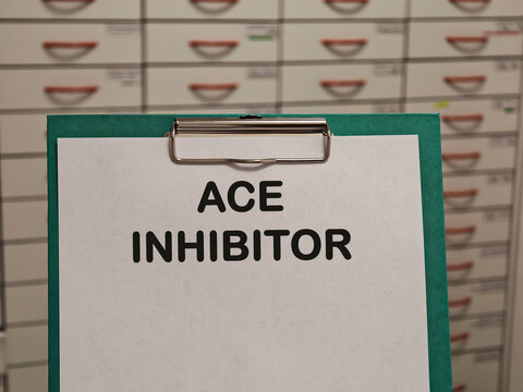 ACE INHIBITOR drug class for hypertension heart failure and kidney protection displayed on a clipboard in a pharmacy healthcare concept