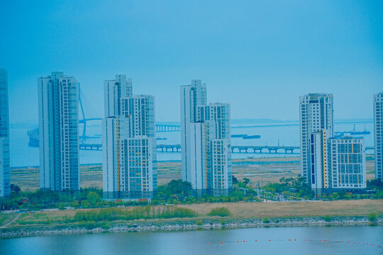 Songdo, Incheon, South Korea; 05 04 2025: The beautiful landscape of Songdo island International Business District (Songdo IBD) in South Korea. It is connected to Incheon airport