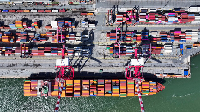 Port Of Lisbon In Lisbon Portugal. Busy Cargo Ships Dock And Load At A Bustling Port. Town Sky Clouds Backgrounds Urban. Town Panorama. Lisbon Portugal.
