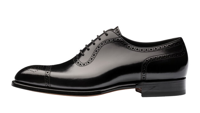 Isolated polished black leather cap-toe Oxford brogue dress shoe for formal menswear