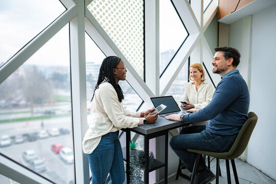 Professional diverse business team meeting together