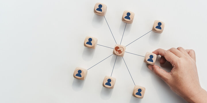 Human centered support network concept, empathy heart icon connecting diverse people blocks, showing emotional intelligence, teamwork, trust, mental health care, compassionate leadership organizations