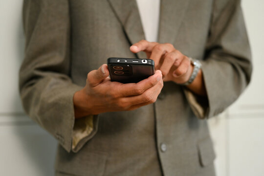 Close Up of Business Professional Using Smartphone in Gray Suit with Watch, Close Up of Hands Typing Message