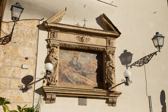 Palermo, Italy; 1st January 2026: This image shows a traditional religious shrine or "ex-voto" located in a street corner in Palermo, Sicily