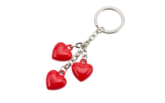 Red heart shaped keychain with three dangling heart charms attached to a metal ring