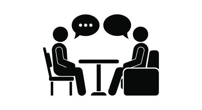 Two people talking in an interview setting