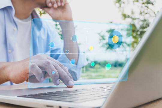 Business professional analyzing market positioning matrix with product comparison bubble chart dashboard on laptop, strategic pricing, competitive analysis, brand positioning marketing decision making