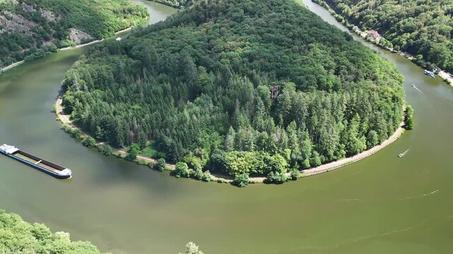 Cargo Ship Navigating the Saar Loop (Saarschleife) in Saarland, Germany