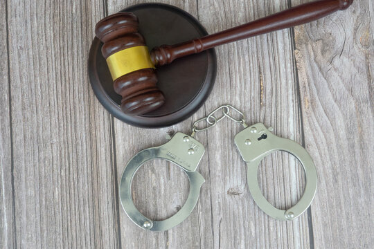 Criminal Law Justice Handcuffs Judicial Gavel and Courtroom Defense Rights