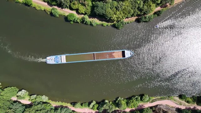 Cargo Ship Navigating the Saar Loop (Saarschleife) in Saarland, Germany