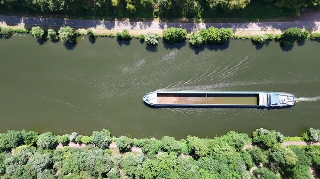 Cargo Ship Navigating the Saar Loop (Saarschleife) in Saarland, Germany