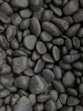 Smooth Black Pebbles Texture Background for Zen Garden