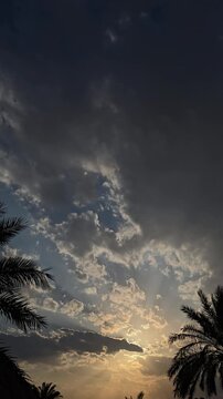 The sky comes alive in this mesmerizing hyperlapse, where the clouds dance gracefully across a golden sunset.