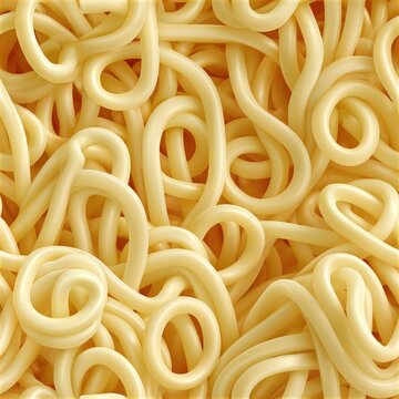 Close up of thick yellow pasta noodles forming abstract swirls and loops