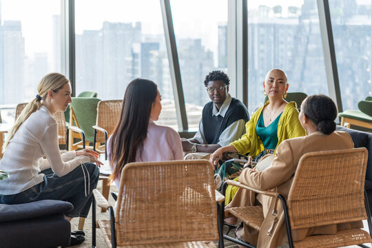 Group of Friends Sharing Ideas in a Modern Urban Setting