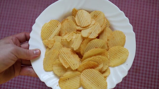 Potato chips salty snack crispy crunch golden slices deliver an addictive fast food style treat for movie nights parties and everyday guilty pleasure