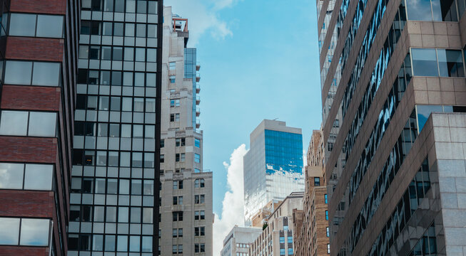 Modern Office Buildings Framing Blue Sky in Midtown Manhattan
