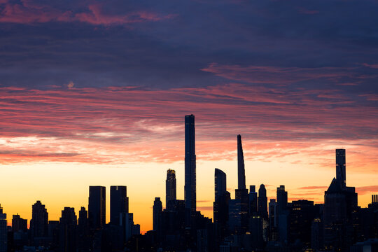 Midtown Manhattan Skyline Silhouetted Against a Dramatic Colorful Sunrise