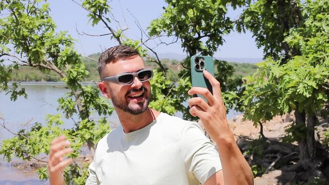 Influencer filming videos from nature during the summer time 