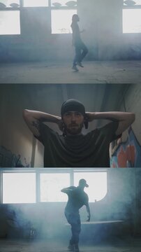 A man performs breakdance moves in a dimly lit room filled with smoke. The walls are decorated with graffiti, adding to the urban atmosphere of the space.