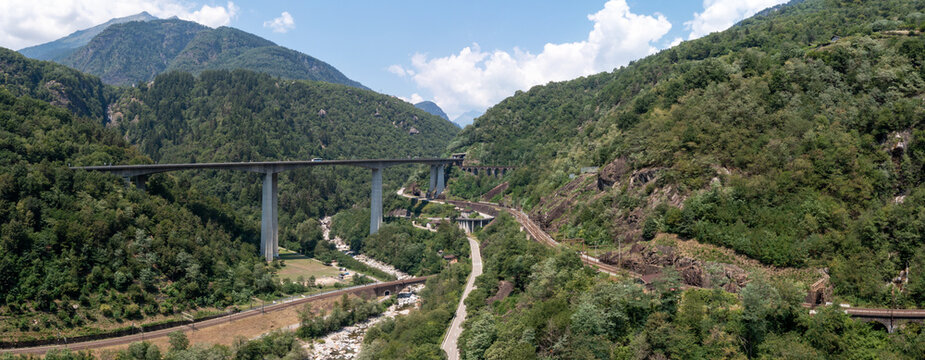 Beautiful highway bridge in Ticino between Giornico and Lavorgo, with an aerial shot you can see all the communication routes, railway, highway and old cantonal road