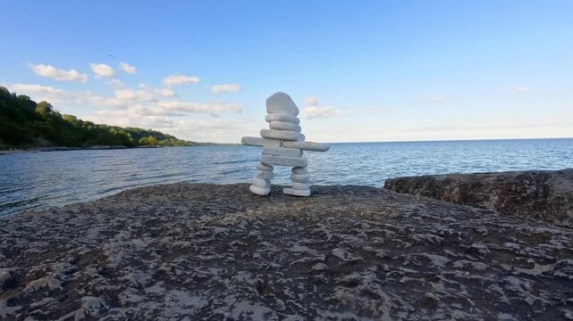 The Calming Beauty Of A Stone Tower Person Gazing Upon The Ever-Changing Ocean In Stunning 4K Resolution