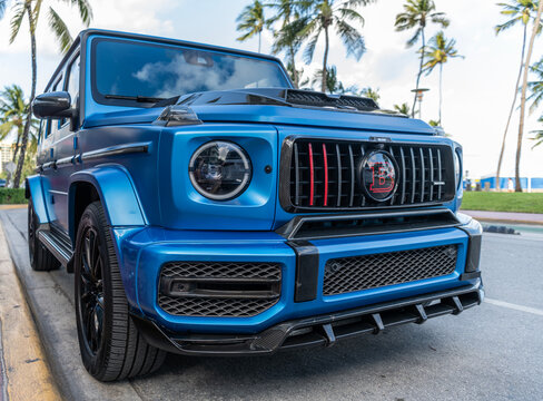 Miami, Florida, USA - July 27, 2025: Car Mercedes Benz AMG G 63 parked outdoor. Blue matte car, corner view. Mercedes-Benz G 63 luxury off road SUV 2022 car. SUV Mercedes Benz AMG G 63