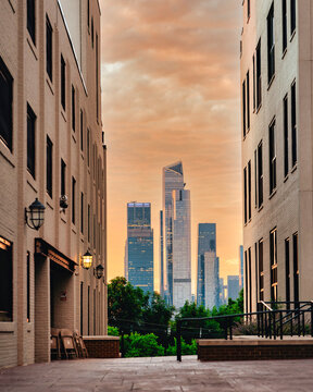 Hudson Yards Skyline Framed by Brick Buildings at Sunset in New York City