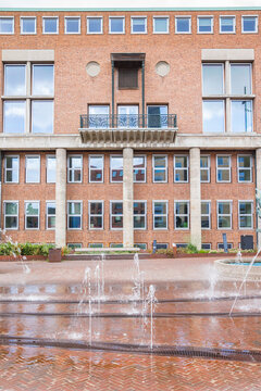 Water fountains in front of the historic town hall in Hengelo, Netherlands