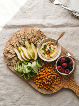 Healthy Hummus and Snack Board with Crackers and Chickpeas
