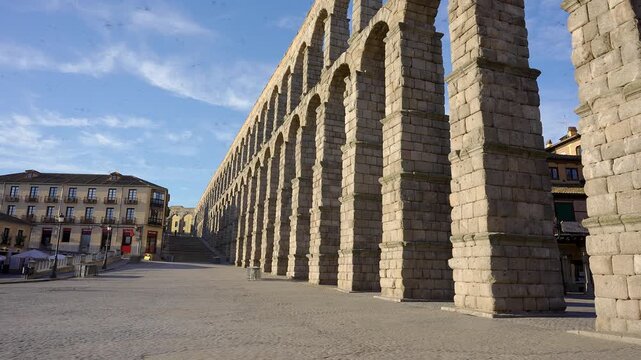 Perspective along the Roman Aqueduct of Segovia overlooking the historic city center