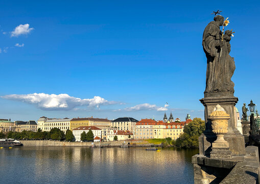 Beautiful view of the city and river on a sunny day. Prague. Czech Republic.
